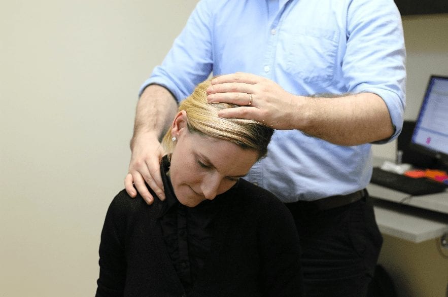 Chiropractic adjustment for neck pain