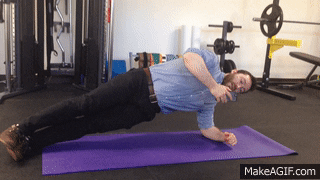 Dr Ben Matheson performing a side-plank exercise