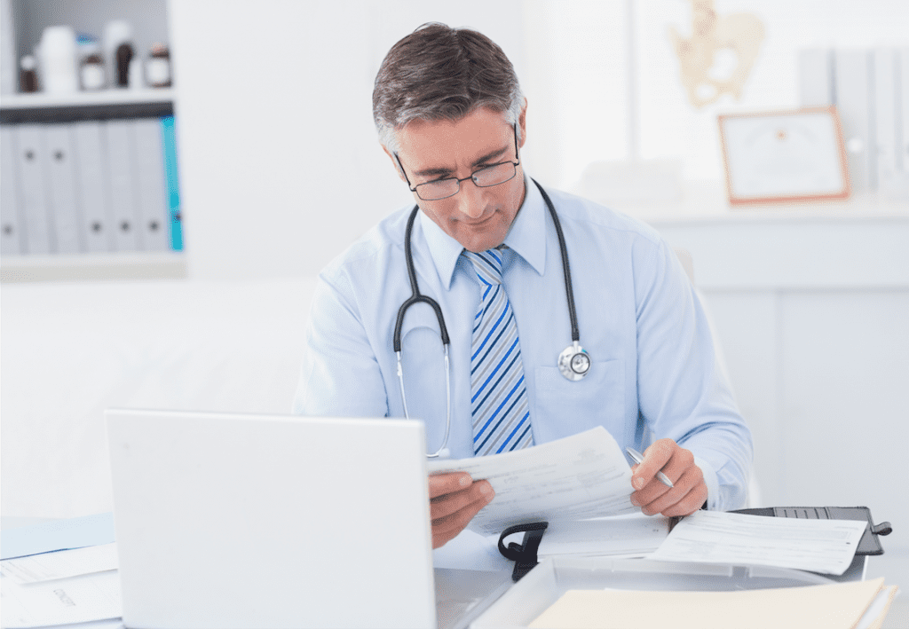 Doctor reading medical article