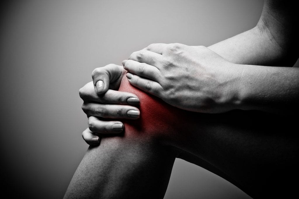 Man suffering from knee osteoarthritis